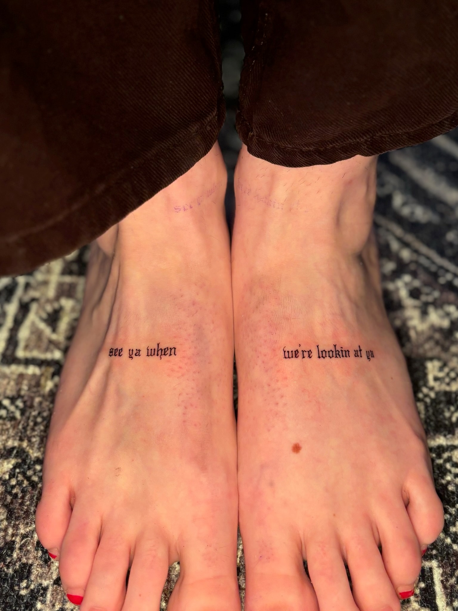 Matching fine line foot tattoos reading see ya when and we're lookin at ya